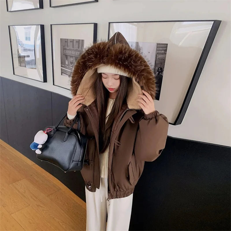 Warm Down jacket Ladies Pai Overcome Winter 2025 New Cotton Padded Coat Women Parkas Horn Hooded Outcoat Big fur collar Overcoat